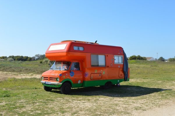 Orange Camper - Chuck and Sandi